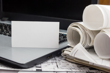 Blank business card with house figure. Real Estate Concept. Top view.