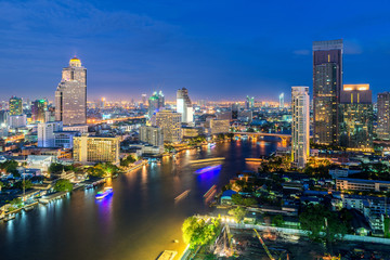 Bangkok skyline along Chao Phraya river in Bangkok, Thailand
