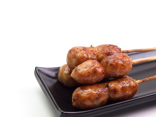 Grilled sausages with herbs and spices