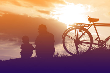 Biker family silhouette father and son