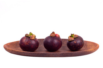 Tropical fruit mangosteen (mangostan) isolated on a white background