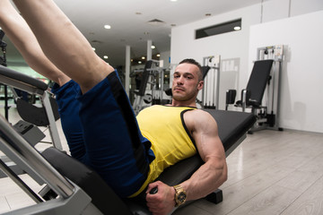 Man On Leg Press Exercise Legs