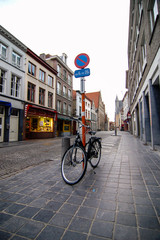 Bike, shopping street in Bruges without people