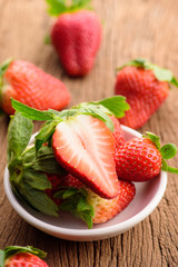 Fresh strawberries on wood table
