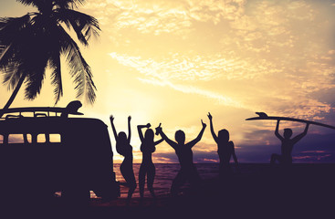 Art photo styles of silhouette surfer party on beach at sunset - vintage color tone
