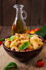 Pasta Gomiti Rigati with meat and vegetables in an Asian style.