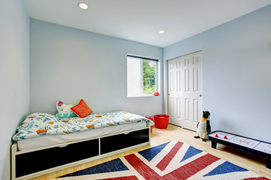 Modern Kids Bedroom Interior In Blue Tones, Hardwood Floor And Walk-in Closet.