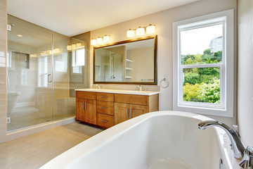 Bathroon  with vanity cabinet and shower area with glass doors