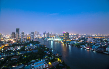 City skyline on riverside Chao Phraya Bangkok Thailand