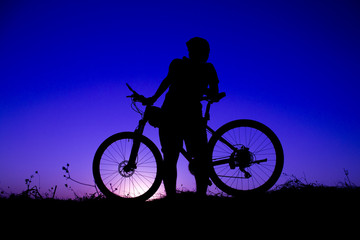 sunset and silhouette backlight bikers