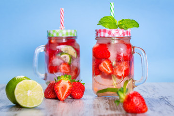 Summer strawberry lemonade in a jar glass