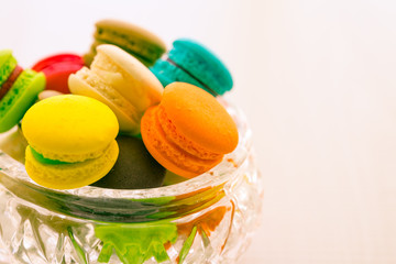 Colorful france macarons in glass cup - Retro tone