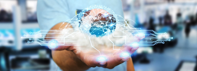 World and cloud connections in businessman hand © sdecoret