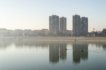 Fototapeta na wymiar Building in a fog along the river Danube