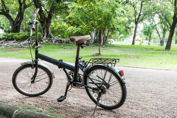 Fototapeta premium Black bicycle parking in a park