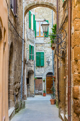 Fototapeta na wymiar Alley in Italian old town Tuscany Italy