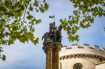 The Templar Seal showing two knights riding on one horse in front of Temple Church in London,...