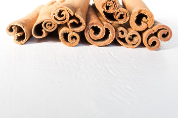 Obraz na płótnie Canvas Cinnamon close up isolated on a white background