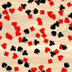 red and black card symbols irregularly scattered on the wooden table - seamless pattern background