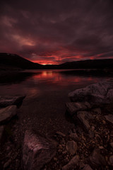 Fototapeta na wymiar Sunset in Norwegian mountains. Autumn red sunset 