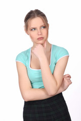 Fototapeta premium Girl with makeup holding her chin. Close up. White background