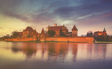 Naklejka na ściany i meble Teutonic Castle in Malbork (Marienburg) in Pomerania (Poland) toned with a retro vintage effect