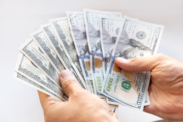 Hand holding money - United States dollar