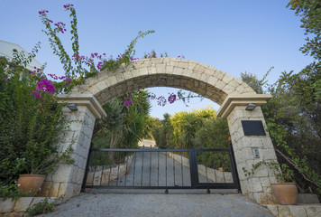 Garden Gate and Arched Vegetation, Path. 
