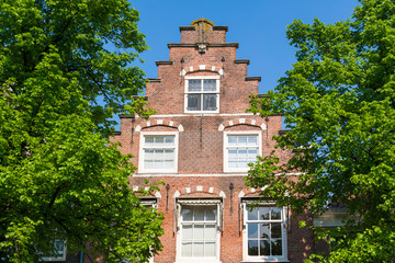 Top of old house with stepped gable on Bakenessergracht canal in city centre of Haarlem, Netherlands