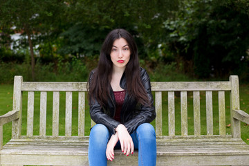 unhappy girl in the park