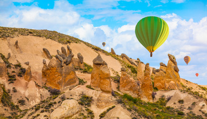 hot air balloons flying over Dream Valley in Cappadocia