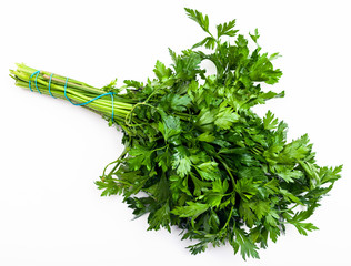 bunch of fresh cut green parsley herb on white