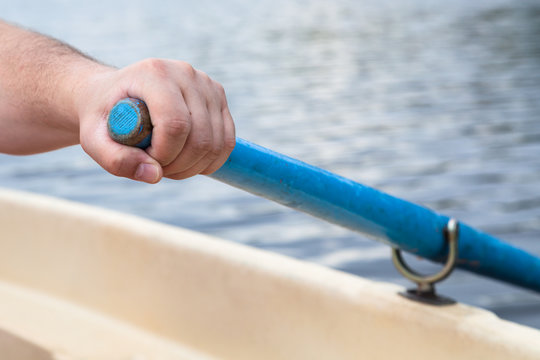 Rower's Hand Holding Oar Close Up