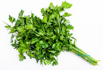 bunch of fresh green parsley herb on white