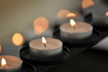 Fototapeta na wymiar SOUL CANDLES An image of burning candles
