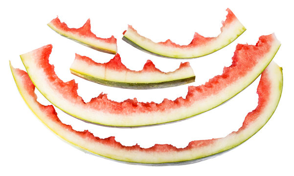 several watermelon rinds isolated on white