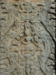 Carving on the wall which made from rock