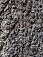 Carving on the wall which made from rock