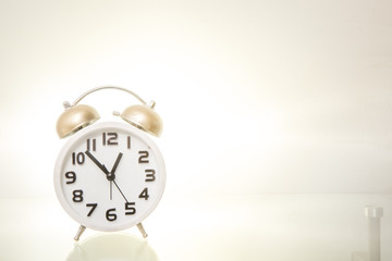 alarm clock isolated on back light