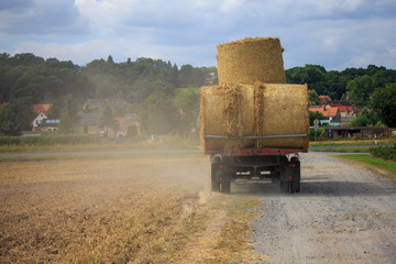 haystacks on tractor