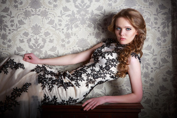 Portrait of a beautiful girl in a beautiful dress with patterns by Parliament