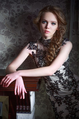 Portrait of a beautiful girl in a beautiful dress with patterns by Parliament