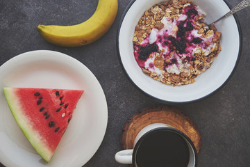 Breakfast with coffee and fruits