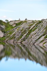 Fototapeta na wymiar Calm mountain lake in Norway