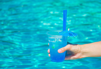 old coctail on the pool background