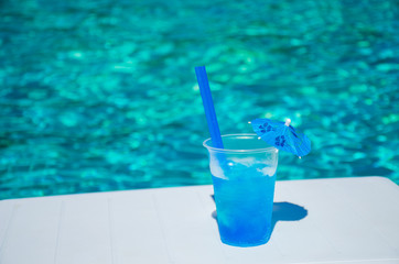 old coctail on the pool background