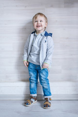 Portrait of little boy in the Studio posing emotions