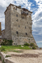 Fototapeta na wymiar Medieval tower in Ouranopoli, Athos, Chalkidiki, Central Macedonia, Greece 