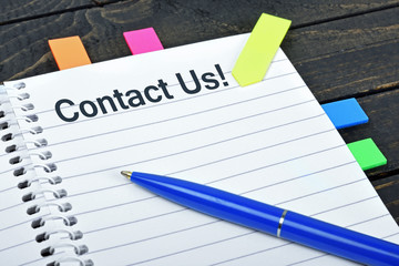Contact us word on notepad