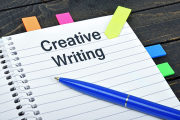 Creative Writing word on notepad